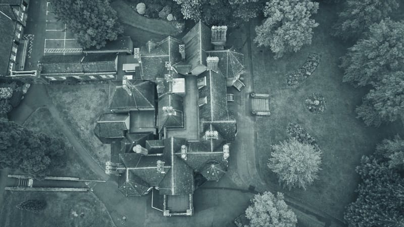 Top-down aerial view of a UK property and its grounds