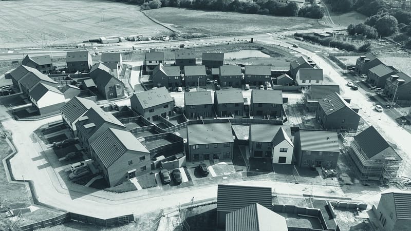 Drone view of new-build housing rooftops